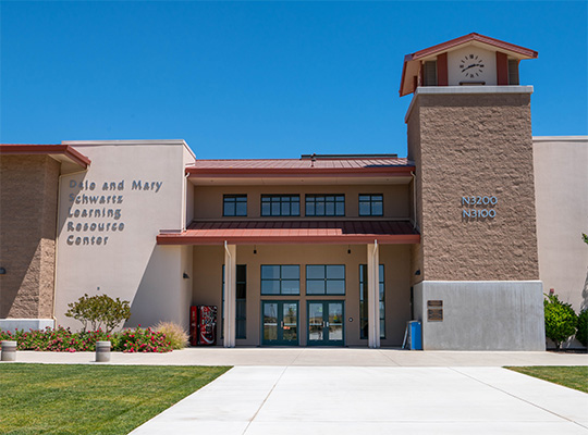 2-story Schwartz Learning Resource Center with blue sky in the backgound